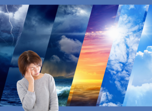 気象の変化に悩む女性